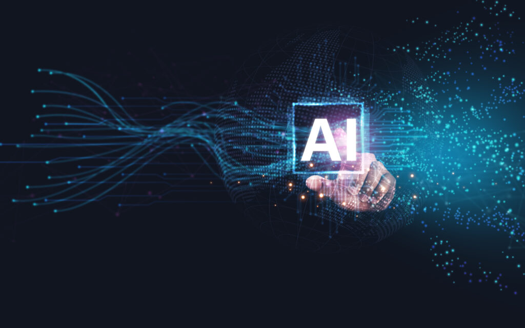 hand pointing to a glowing AI symbol