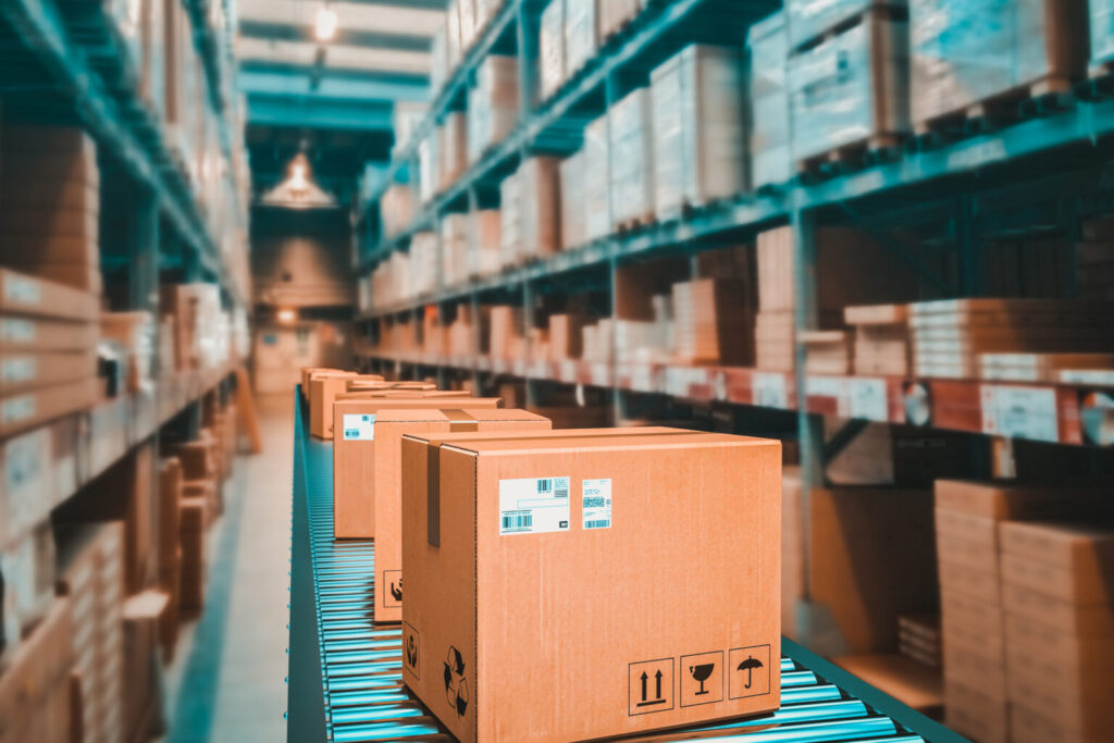 boxes-being-moved-down-a-conveyor-belt-in-a-distribution-center