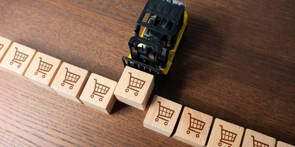Forklift moving "bulk orders" of wooden blocks.